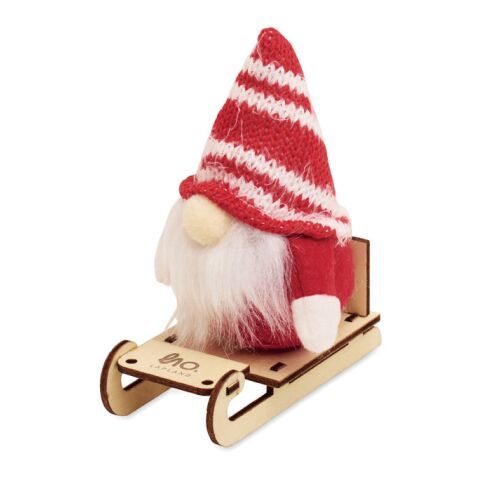 Gnome on wooden sleigh