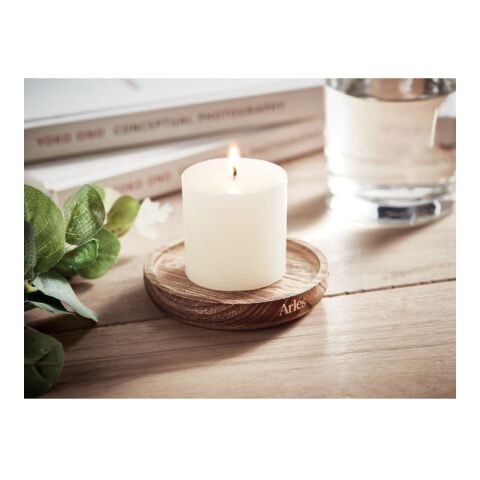 Candle on round wooden base