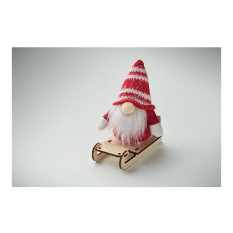 Gnome on wooden sleigh red