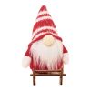 Gnome on wooden sleigh red